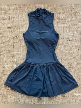 Blue tennis dress with pleated skirt